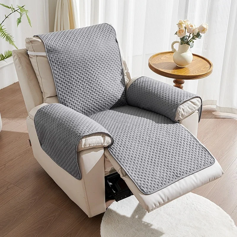 Grey quilted recliner cover