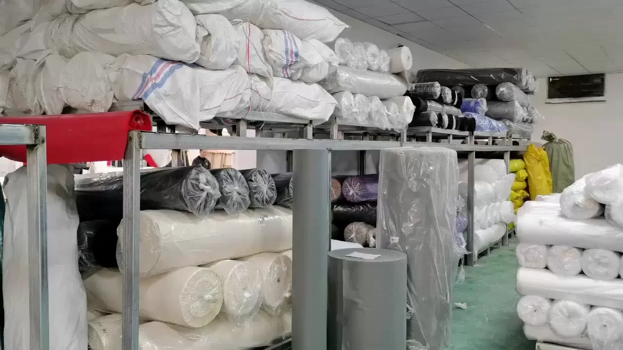 Fabric rolls stored on shelves